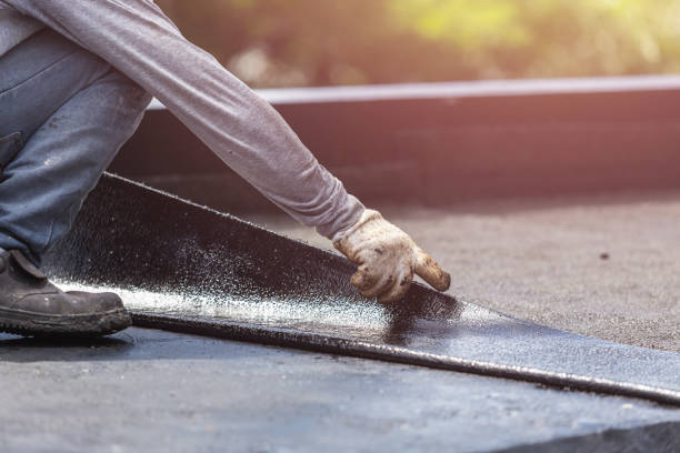 Professional Basement Waterproofing technician working in Saint Johns, OH